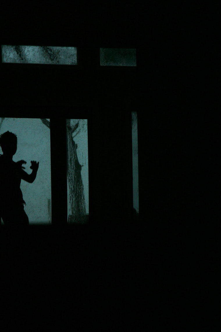 watching-a-scary-storm-through-a-window